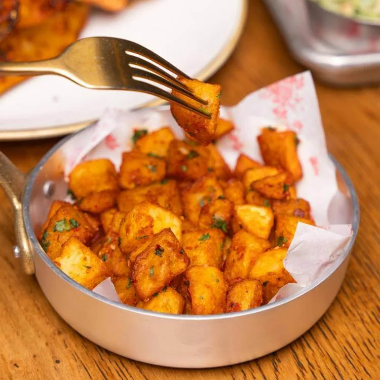 Spanish patatas bravas with smoked paprika powder