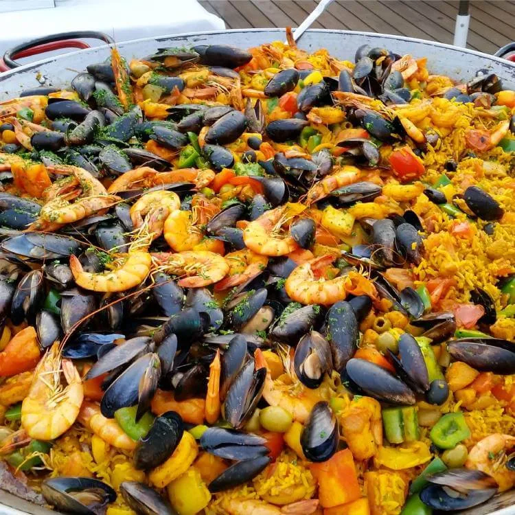 Classic paella with chicken and seafood