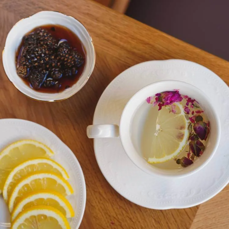 Elderflower syrup with lemon and rose petals